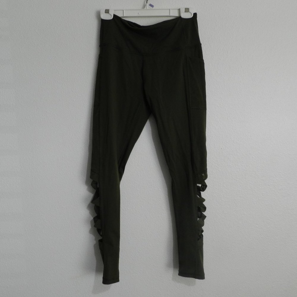 Victoria Sport criss-cross mesh ribbon leg accent , pocketed stretch leggings